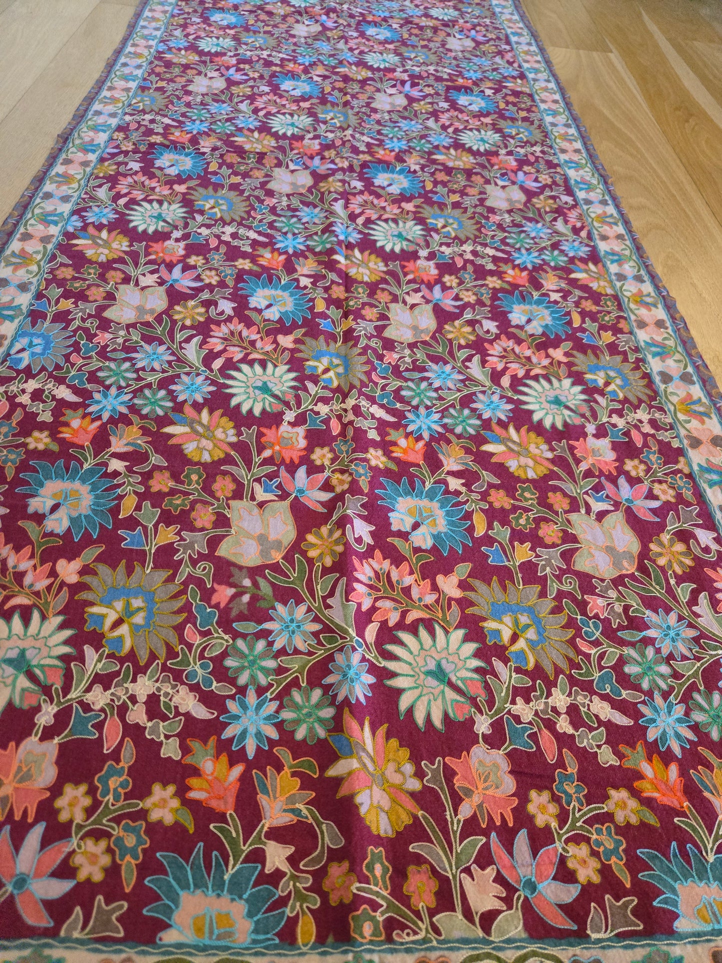 A Kashmiri Semi Pashmina shawl handwoven to a perfect precision, is enriched with the art of Kalamkari which transforms this masterpiece